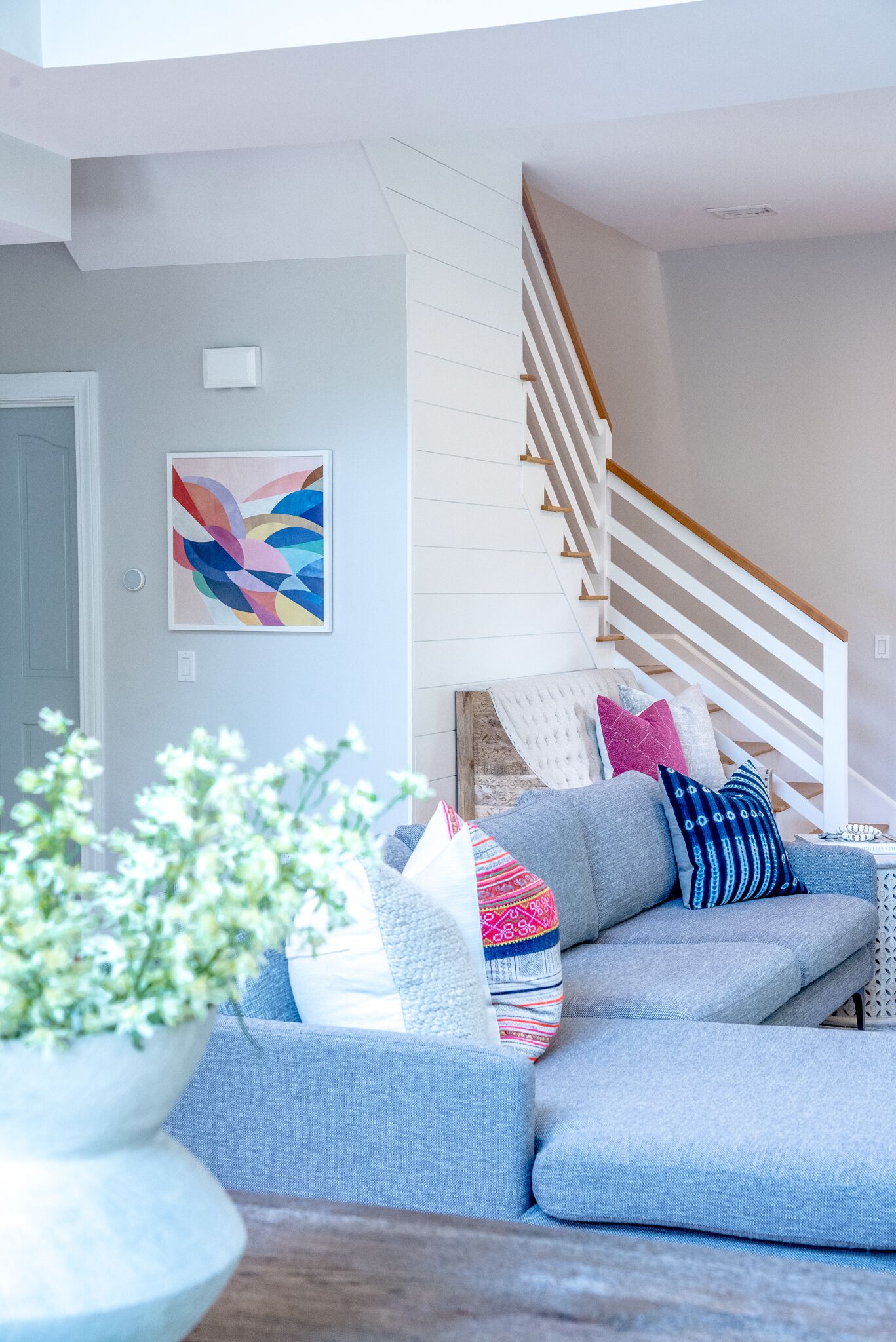 Cozy seating below the stairs