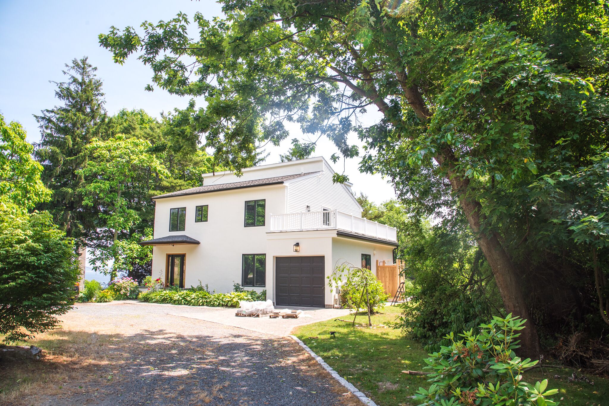 U Shaped dual entry driveway with garage and Parking for 7-8 Cars.
